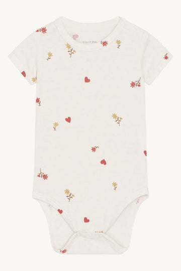 Body neonata a manica corta in bamboo, con fiorellini e cuoricini