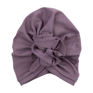Wooly Organic- berretto viola con fiocco