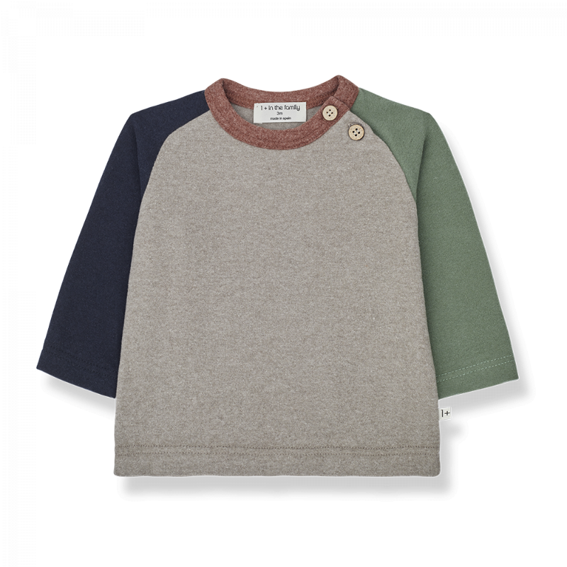 Maglia a manica lunga tonalità talpa  con maniche bicolor.