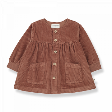 Abito bambina a costine in velluto, tonalità zucca. Apertura tramite bottoni