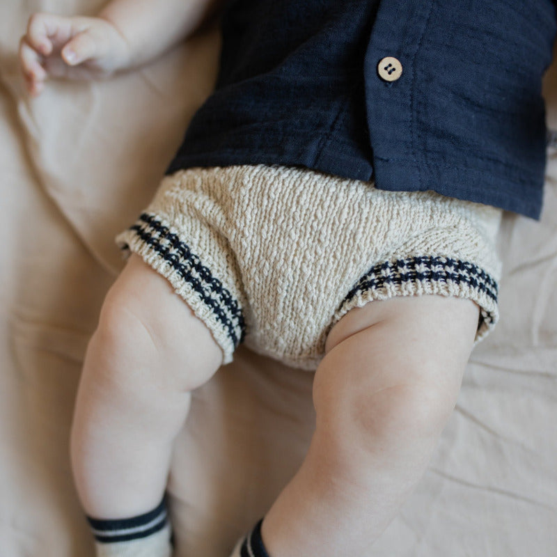 Pantaloncino neonato tricot, color panna e blu notte, della collezione SS23 1+ in the Family