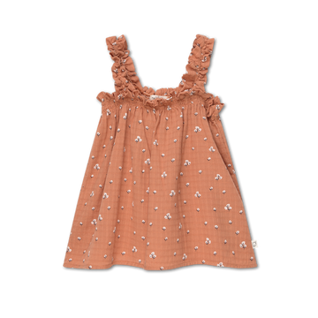 canotta top per bambina, firmata My Little Cozmo, a trama floreale su fondo terracotta. Tessuto in mussola di cotone, spalle larghe a punto smock, pannello punto smock ad altezza petto