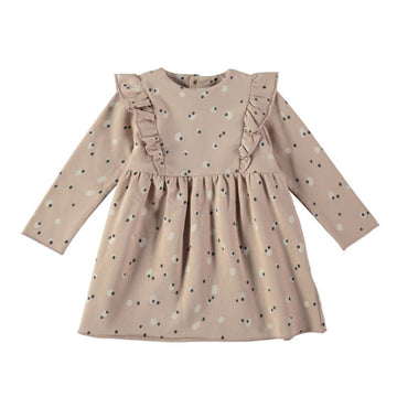 Un bellissimo abito in caldo cotone biologico sulle tonalità del rosa con tanti spots sparsi su tutto il capo. Apertura sul retro tramite bottoncini in legno e volants ad altezza busto.