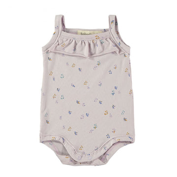  body neonata con spallina e tanti fiorellini su fondo lavanda