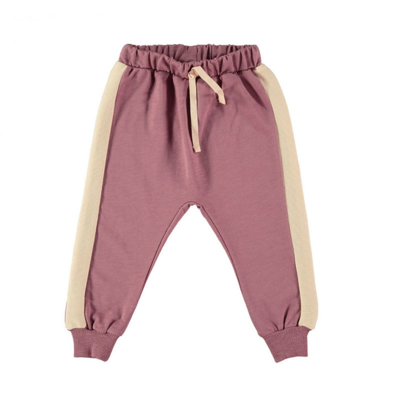 Pantalome bambina color borgogna, elastico in vita e sui polsini con bordo a costine, fettuccia regolabile, dettaglio laterale a costine