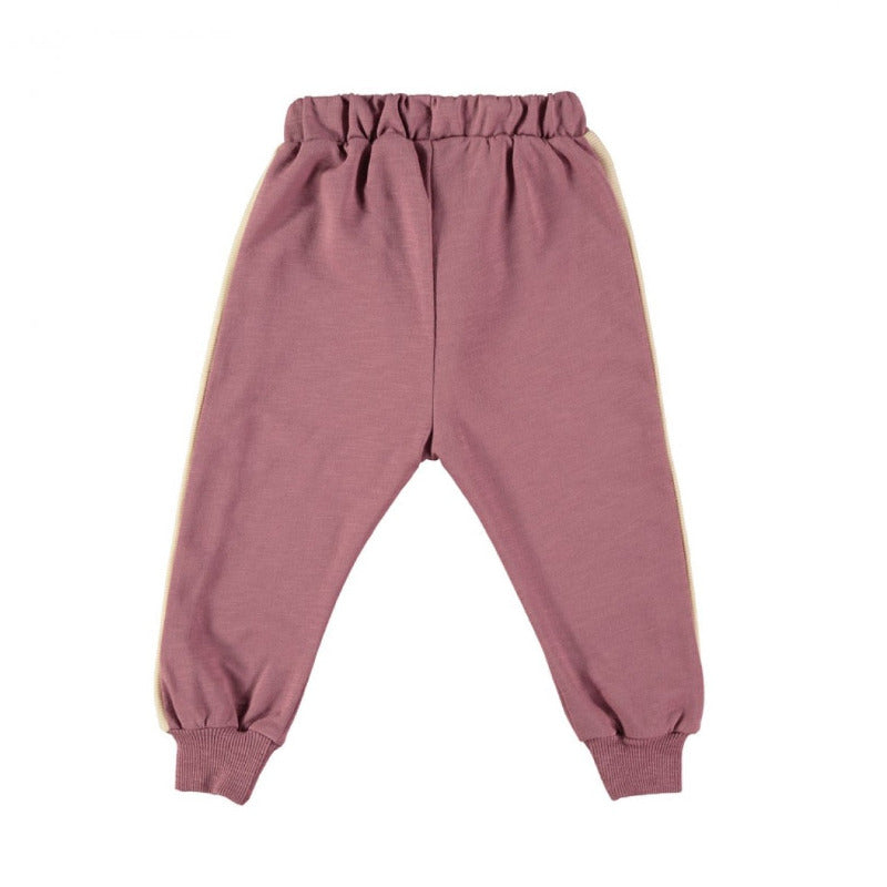 Pantalome bambina color borgogna, elastico in vita e sui polsini con bordo a costine, fettuccia regolabile, dettaglio laterale a costine