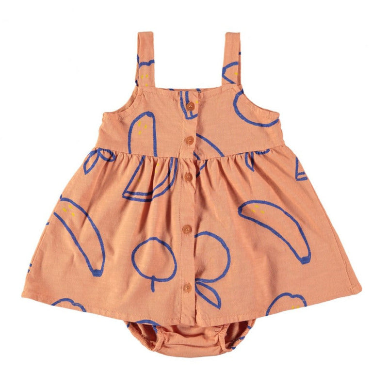 Grazioso abito bambina in morbido e leggero cotone biologico con trama a frutti su fondo arancio. Taglio svasato, apertura frontale tramite bottoni.