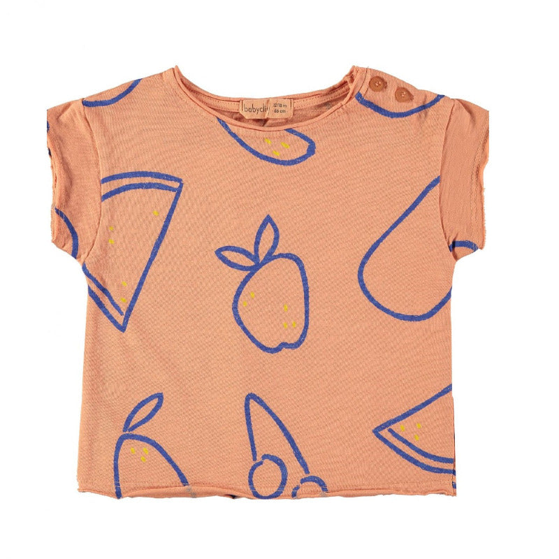 t-shirt bambini in cotone biologico a manica corta, con tanti frutti blu su fondo arancio. Finiture con bordi grezzi