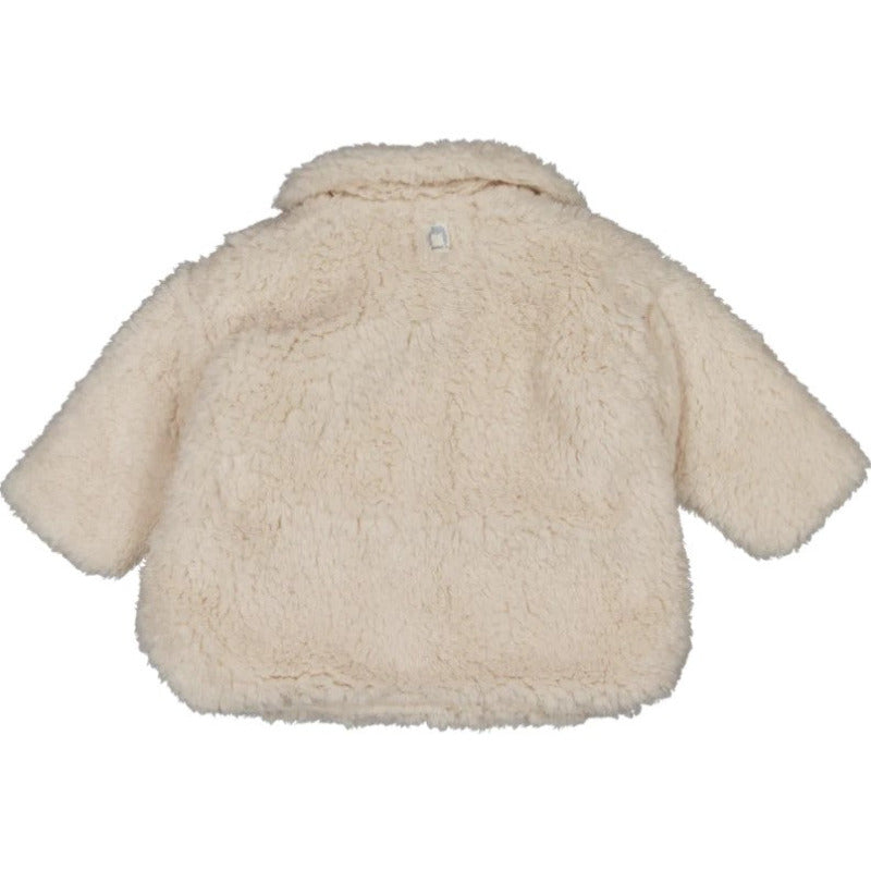 Una bellissima giacca sherpa con soffice superficie bouclè, perfetta per tenere al caldo il corpo dei vostri bambini. Capo realizzato in morbidissima pelliccia ecologica, è in tonalità ecru, haun'apertura frontale tramite bottoni e due piccola tasche.