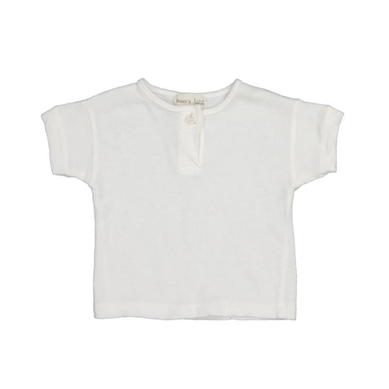 t-shirt bambini a manica corta in un morbido mix di cotone e lino di altissima qualità, in tonalità bianco. Apertura tramite bottoni altezza petto.