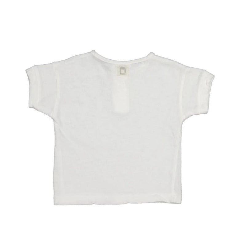 t-shirt bambini a manica corta in un morbido mix di cotone e lino di altissima qualità, in tonalità bianco. Apertura tramite bottoni altezza petto.