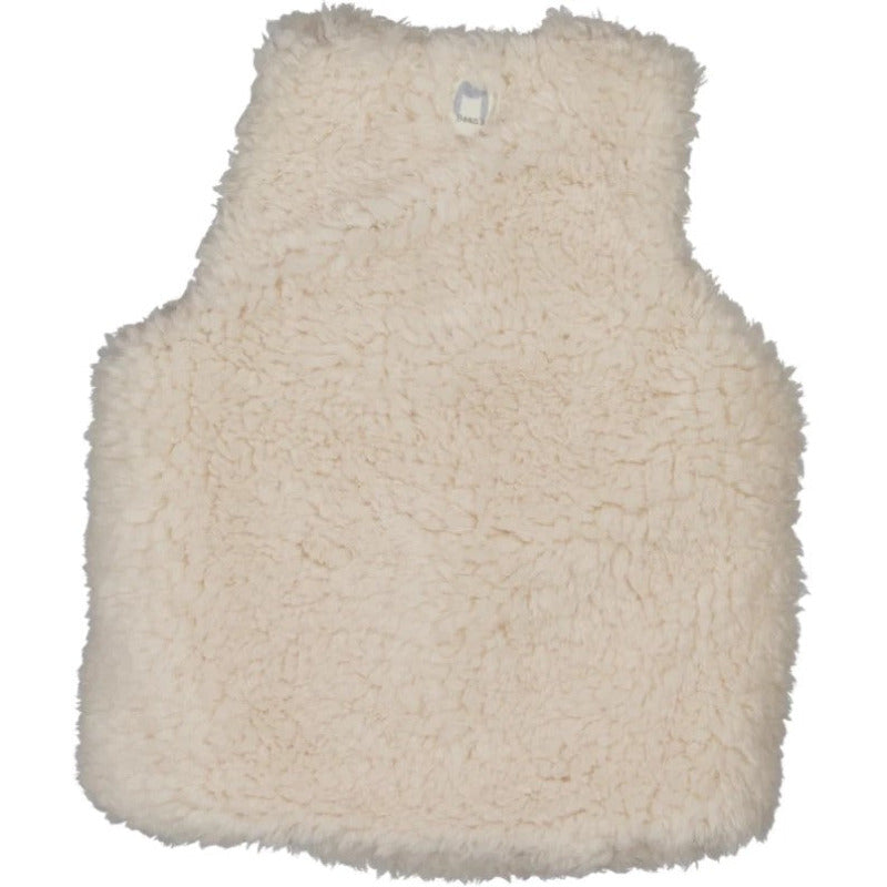 Una bellissima giacca gilet sherpa con soffice superficie bouclè, perfetta per tenere al caldo il corpo dei vostri bambini. Capo realizzato in morbidissima pelliccia ecologica, è perfetta da essere indossata sopra una t-shirt, una felpa o un abito. I borttoni sono realizzati con materiali riciclati e bioresine.